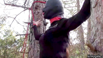 tied to a tree  rammed in her throat