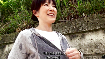 Sweaty older Japanese woman with massive tits uses them on my feet