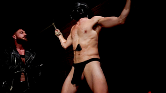 Ethan Sinns lesson begins in the dungeon where he is stripped down and tied to the wa
