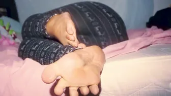 African mom posing you with her pretty foot
