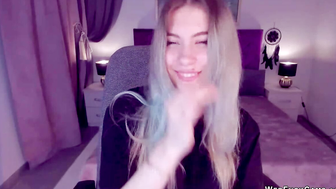 Blonde teen smoking and stripping off