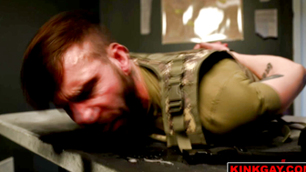 Buck on a dirty mattress inside a jail cell