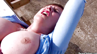 Hairy huge tits granny outdoors solo