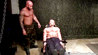 Soldier Dirk Caber takes all the painful shock from his big balls and naked nipples