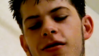 Sexy Bleu is blowing smoke and stroking his cock in the while taking a shower