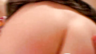 Cute redhead fellating a dildo
