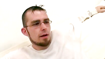 Twink wears sexy glasses while jerking off his thick cock