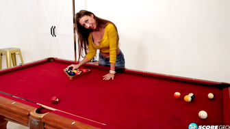 MILF Harlow gets up on a pool table and plays with her pussy
