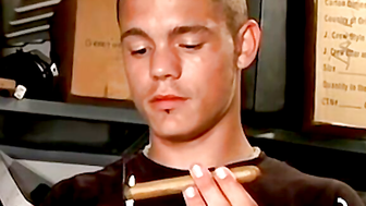 Handsome guy with necklace blow his smoke and spills his cum