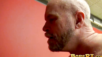 Hot daddy Jake Mitchell plows his thick cock deeply into the hairy ass of Jack Sulliv