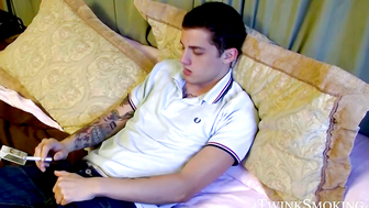 Tattooed Chris Porter solo smoking and cock stroking