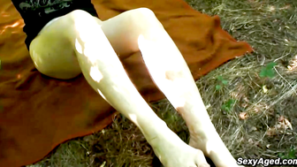 Hairy pussy granny fucks in the woods