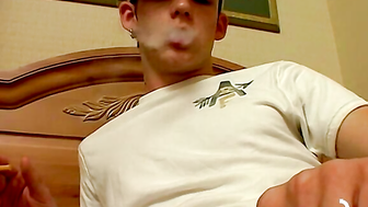 Seductive Smoking Twink Indulges in Sensational Threesome