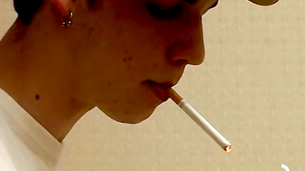 Seductive Smoking Twink Indulges in Sensational Threesome