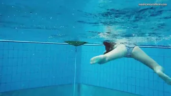 Gigantic boobies teens Liza Bubarek swimming nude into the pool