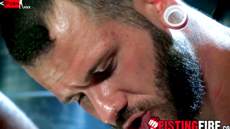 Hunky Dillion Diaz is chained down while being tormented with a massive cock