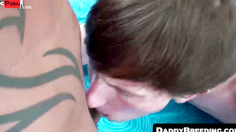 DaddyBreeding.com - Horny twink bounces on tattoed daddies big hard cock on the bed u