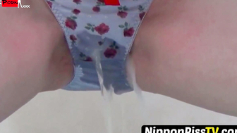 NipponPissTV.com - Young Japanese vixen soaking her panties up with pee in public