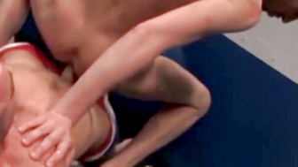 Over on the wrestling mat, RSS exclusive Taurus, in a tight blue singlet, and Julien