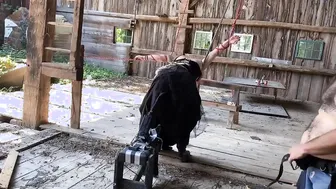 Bound up and Nailed by Machine inside Barn