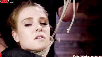 Bondage babe suspended and whipped
