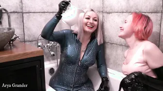 Bae Dyke Girls having Fun Topless inside Restroom Rubber Latex Funny Film
