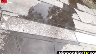 NipponPissTV.com - Real Japanese lady filmed while peeing in closeup outdoors