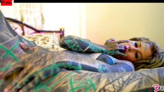 Burning Desire Tattooed Temptress Teases and Pleasures Herself