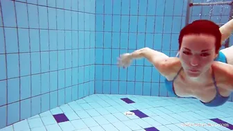 Tight blue swimsuit goddess Martina into the pool