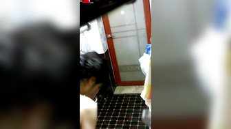 Peeking at China girls bathing in the bathroom