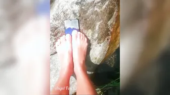 Traveler women Crushing the Phone with Foot and Throwing into the Water