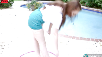 Lillith Adams shows off her Hula Hoop skills. Then, she swivels her hips on a stud's cock until he blasts her with a cum facial.