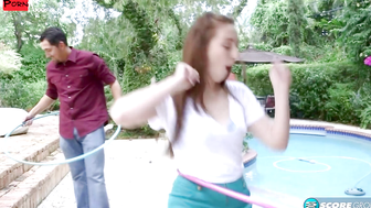 Lillith Adams shows off her Hula Hoop skills. Then, she swivels her hips on a stud's cock until he blasts her with a cum facial.