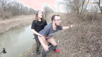 Hiding from cars while fucking with a strap-on