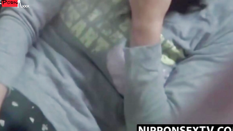 Cute Japanese sweetie reaches her yummy slit for gentle play