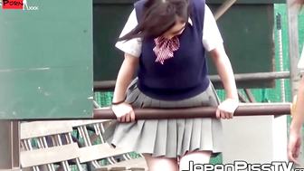 Japanese teen schoolgirls are playing and peeing outdoor