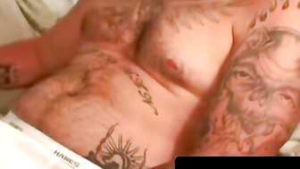 Heavily tattooed older guy wanks hard in his room