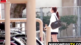 Sultry Asian in knee socks hunts quiet spot for urgent piss