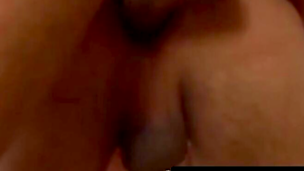 Young Latino wears goggles while cock riding