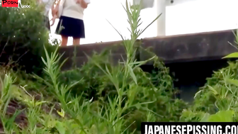 Voyeurs cam catches two Asian ladies firing long piss streams