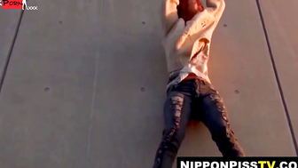 Bound Asian stunners stream pee down their tight pant legs