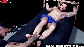 MaleFeetXXX.com - Restrained athlete endures tickling torment on feet and body