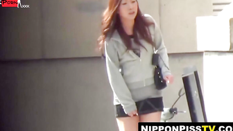 Adorable Japanese stunners unaware of cam during their pee