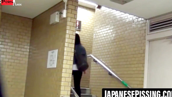 Asian ladies tailed by a voyeur until they piss in the toilet