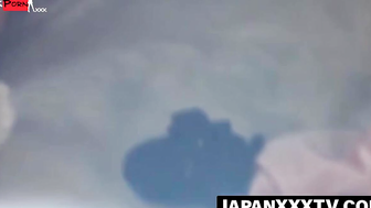 Cameraman catches Asian lady satisfying her cunts need