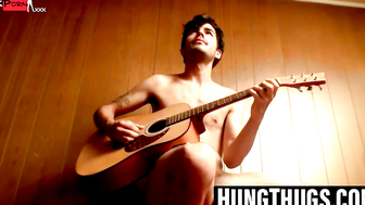 Shirtless Guitarist Plays Acoustic Guitar While Masturbating