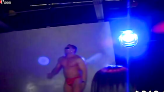 Naked Strippers Dancing on Tables in Club with Crowd Watching