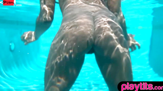 Petite kinky ebony MILF strips naked and masturbates in the pool