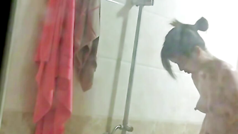 Peeking at China girls bathing in the bathroom