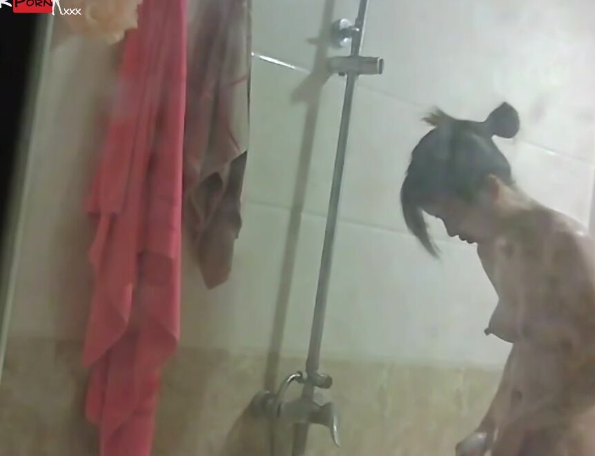 Peeking at China girls bathing in the bathroom